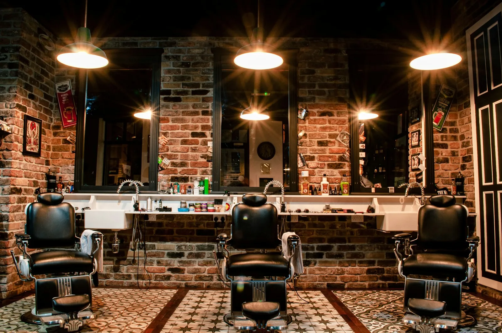 Interior of Edge Barbershop with vintage barber chairs and exposed brick walls