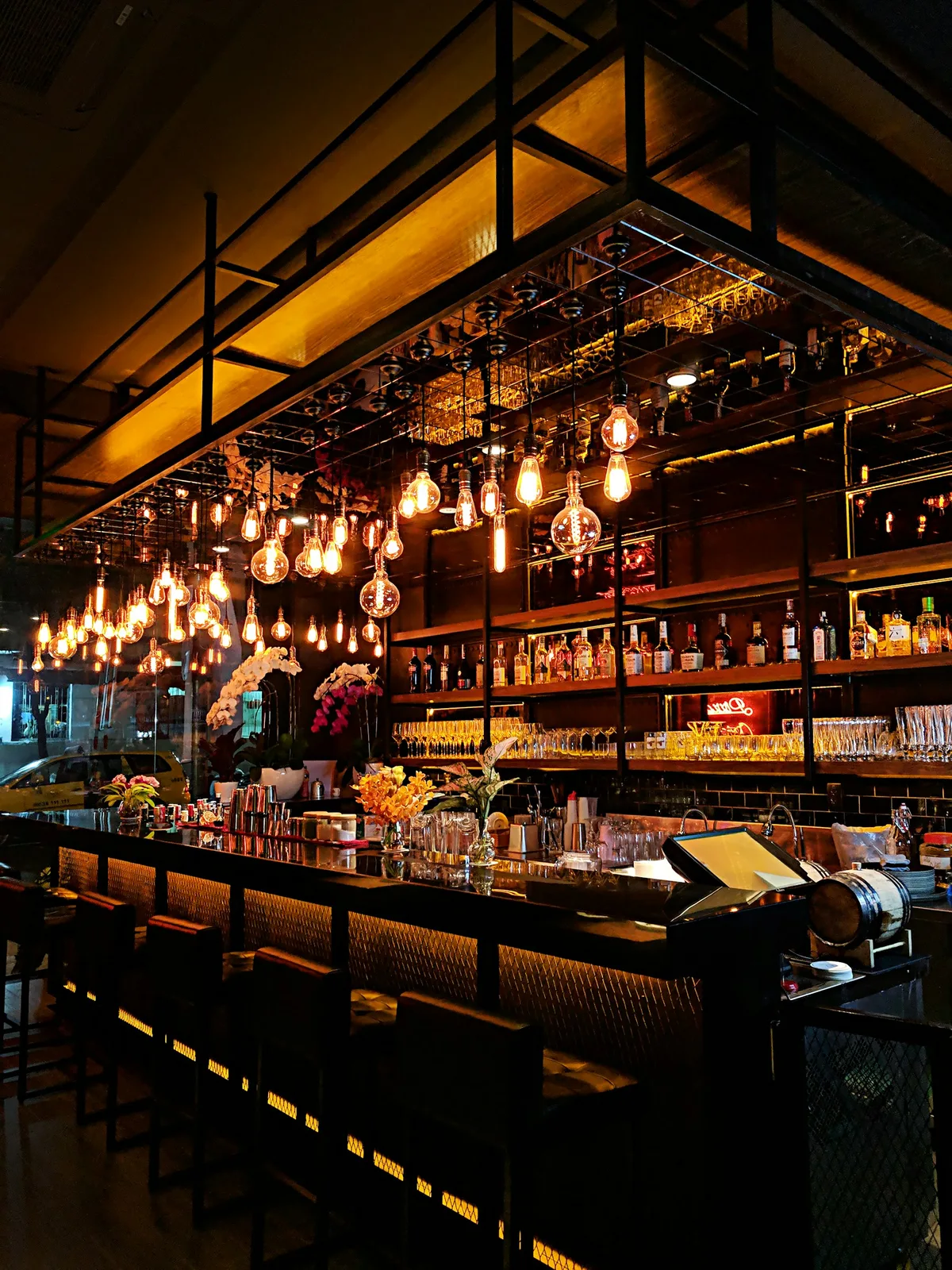 Candlelit interior of Vigne wine bar